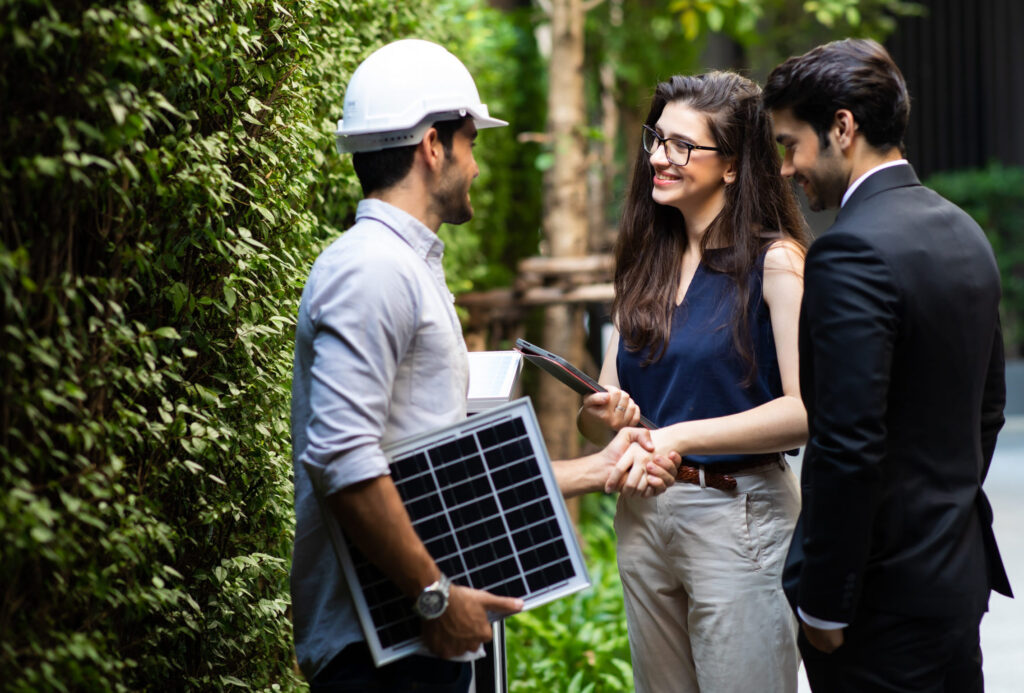 three people talking